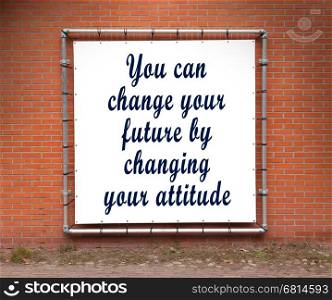 Large banner with inspirational quote on a brick wall - You can change your future...