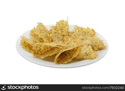 Large cheesy chips on the plate on an isolated background. Large cheesy chips on the plate