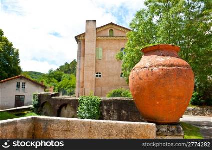 Large Clay Pot Decorating the Streets of the Medieval French City