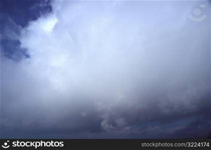 Large Cloud Filling A Dark Blue Sky