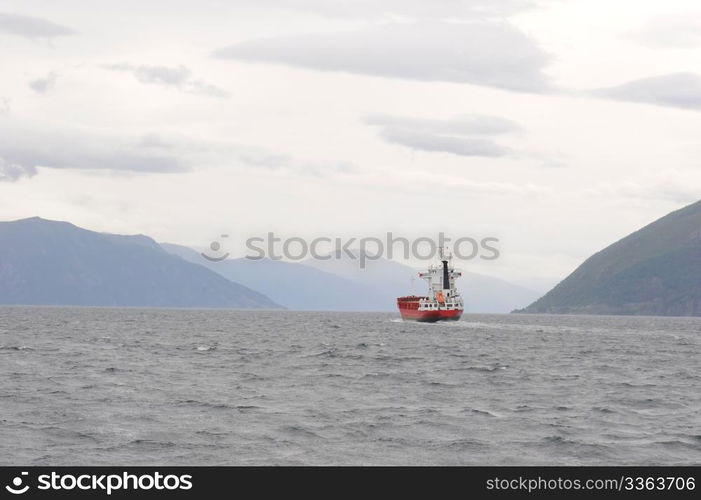 Large commercial boat in norvegian fjords