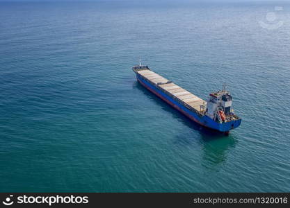 Large container ship at sea. Aerial top view of cargo container ship vessel import export container sailing.