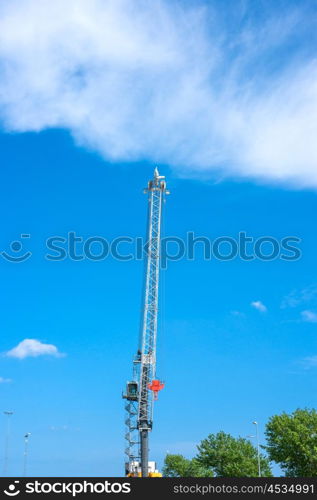 Large crane machinery in daylight and blue sky