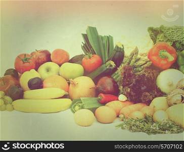 Large display of various fruit and vegetables with a vintage effect