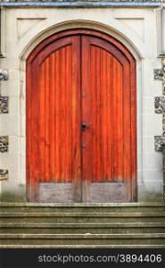 Large double brown orange wood old door in England