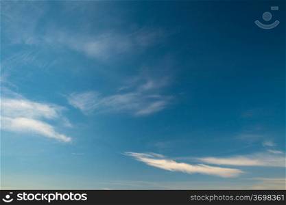 Large fragment of the sky with a few cirrus clouds. Photos shot with a polarizing filter. Abstract beautiful backdrop for any purpose