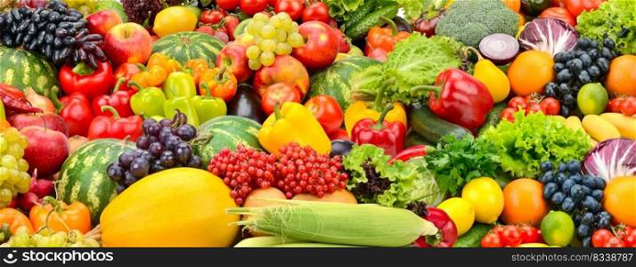 Large fruit colorful panoramic background of fresh and healthy vegetables and fruits.