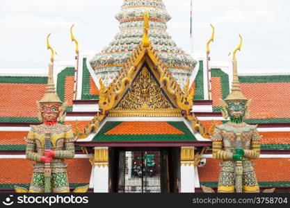 Large giant statues. Around the door Wat Phra Kaew.