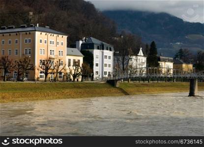 Large luxury homes beside the Salzach River, Salzburg, Austria