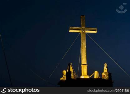 Large metal cross, 7 meters high, on a rock above the Monastery of Myrtidia in Kythira. The cross according to an inscription on the stone base is a tribute to the monastery, of a Kythera immigrant in Australia. From here you have a view to the Monastery of Myrtidia, but it is also an ideal place to enjoy the sunset.. Large metal cross, 7 meters high, on a rock above the Monastery of Myrtidia in Kythira. From here you have a view to the Monastery of Myrtidia.