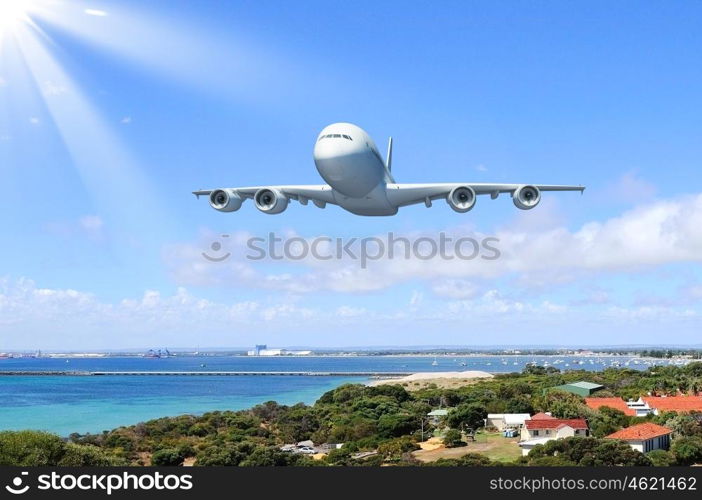 Large passenger airplane flying in the sky