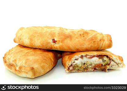 Large pastry filled with mashed potato, turkey, gravy, stuffing, cranberry sauce.
