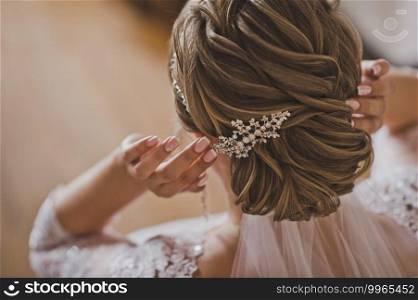 Large photo of the wedding hairstyle girls.. Wedding hairstyle of a beautiful girl close-up 2149.