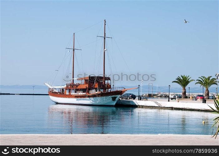 large sailing ship on an empty Greek waterfront