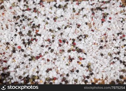 Large sea salt with red and black pepper. Large sea salt with red and black pepper .