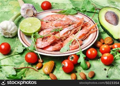 large shrimp and seasonal vegetables. Delicious shrimp with lime sauce,greens,avocado and tomatoes