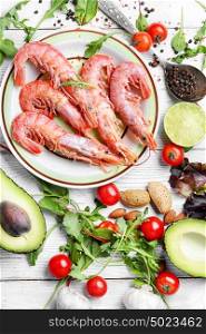 large shrimp and seasonal vegetables. Delicious shrimp with lime sauce,greens,avocado and tomatoes