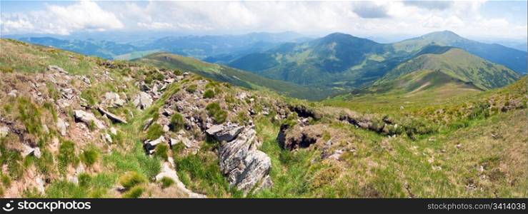 Large stones on summer mountainside (Ukraine, Carpathian Mountains). Three shots stitch image.