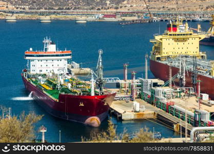 large tankers unloading crude oil