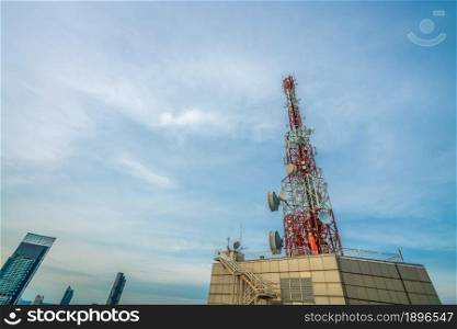 Large telecommunication tower against sky and clouds in background . Internet network connection concept .. Large telecommunication tower against sky and clouds in background