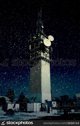 Large Telecommunications Tower in Snowy Cold Remote Area
