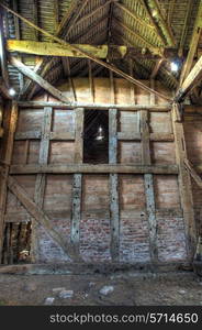 Large timber-framed and brick hay barn, Worcestershire, England.