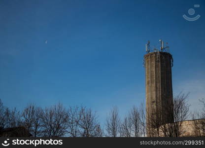 Large tower and little moon scene