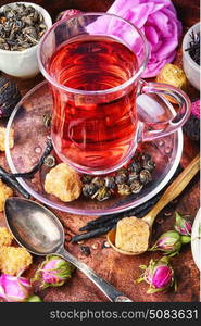 large variety black tea,green tea,rose tea in a copper tray. Tea cup and herbal tea