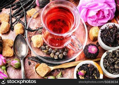 large variety black tea,green tea,rose tea in a copper tray. Tea cup and herbal tea