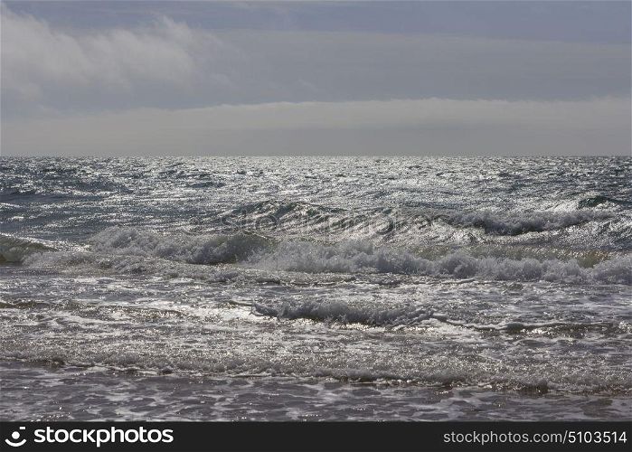 Large wave in the ocean during storm. Large wave in the ocean during storm.