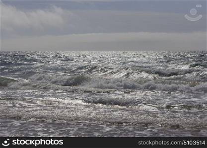Large wave in the ocean during storm. Large wave in the ocean during storm.