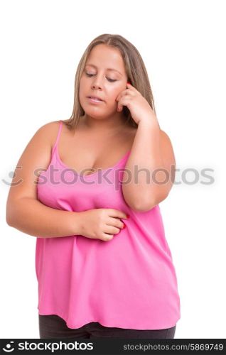Large woman worried about her weight, isolated over white