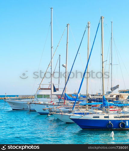 Larnaca marina with yachts and sailboats in bright sunshine daytime, Cyprus