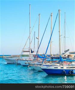 Larnaca marina with yachts and sailboats in bright sunshine daytime, Cyprus