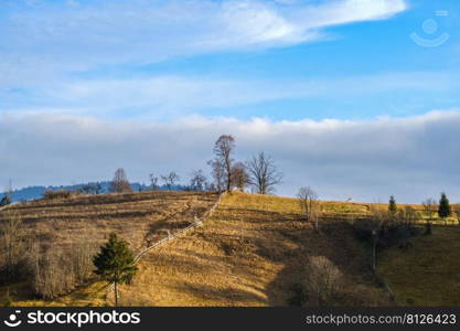 Last good weather days in autumn mountain countryside. Peaceful picturesque Ukrainian Carpathians mountains scene.