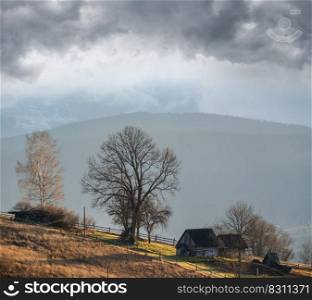 Last good weather days in autumn mountain countryside. Peaceful picturesque Ukrainian Carpathians mountains scene.