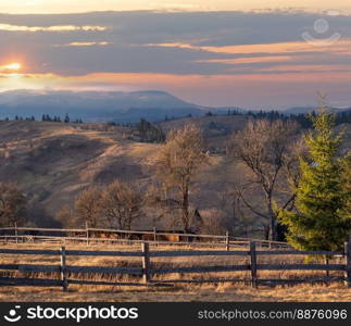 Last good weather days in autumn mountain countryside. Peaceful picturesque Ukrainian Carpathians mountains scene.