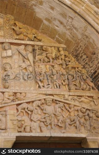 Last Judgment carving showing tortures and punishments of Hell, from the 13th century, Abbey Church of St. Foy, Conques, France
