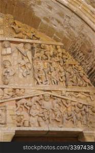 Last Judgment carving showing tortures and punishments of Hell, from the 13th century, Abbey Church of St. Foy, Conques, France