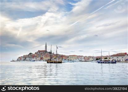Late afternoon in the old Istrian town of Rovinj or Rovigno in the Adriatic Sea of Croatia with the Saint Euphemia&rsquo;s Basilica dominating the town.