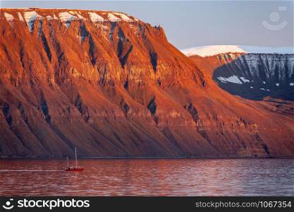 Late afternoon sunlight on the mountains of Liefdefjord near Longyearbyen in the Svalbard Islands (Spitzbergen) in the high Arctic.