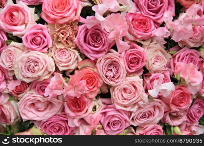 Lathyrus and roses in a pink wedding arrangement