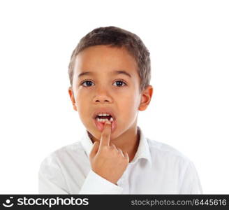 Latin child showing his new teeth isolated on a white background