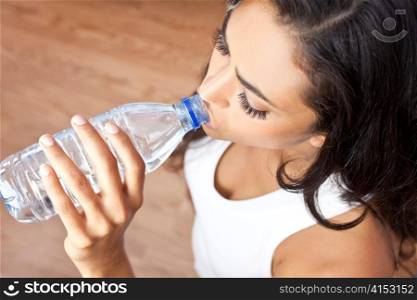 Latina Hispanic Woman Girl Drinking Water Bottle at Gym