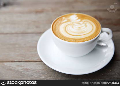 latte coffee on wood background