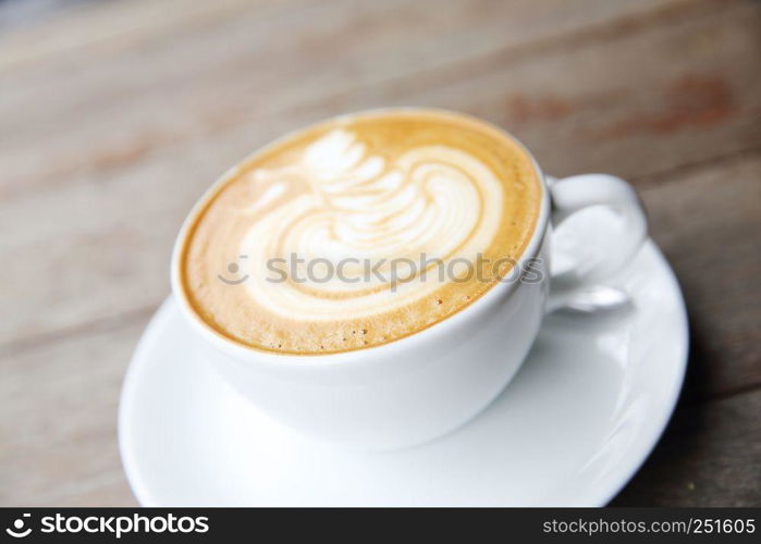 latte coffee on wood background