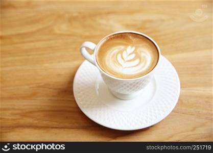 latte coffee on wood background