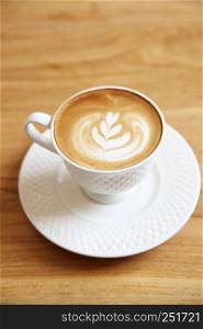 latte coffee on wood background