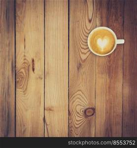 Latte coffee on wood background and texture with space