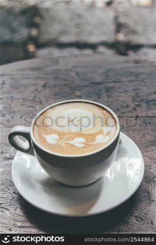 latte coffee on wood table